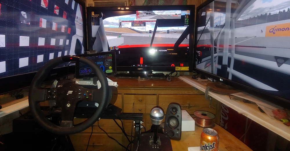My triple monitor setup for sim racing.